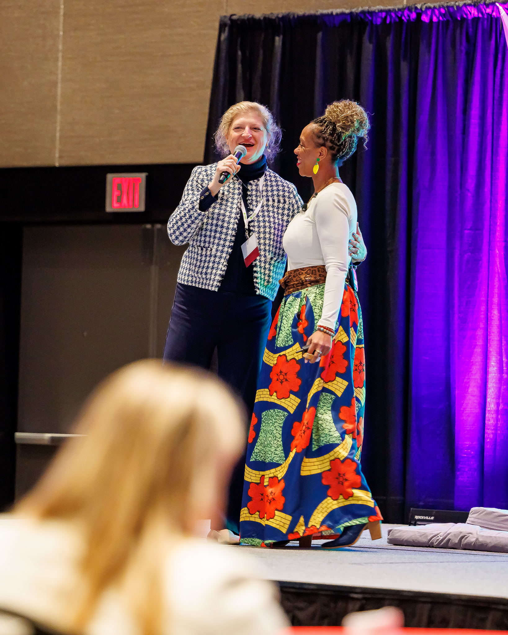 Shawntà Hooks on stage at a speaking event