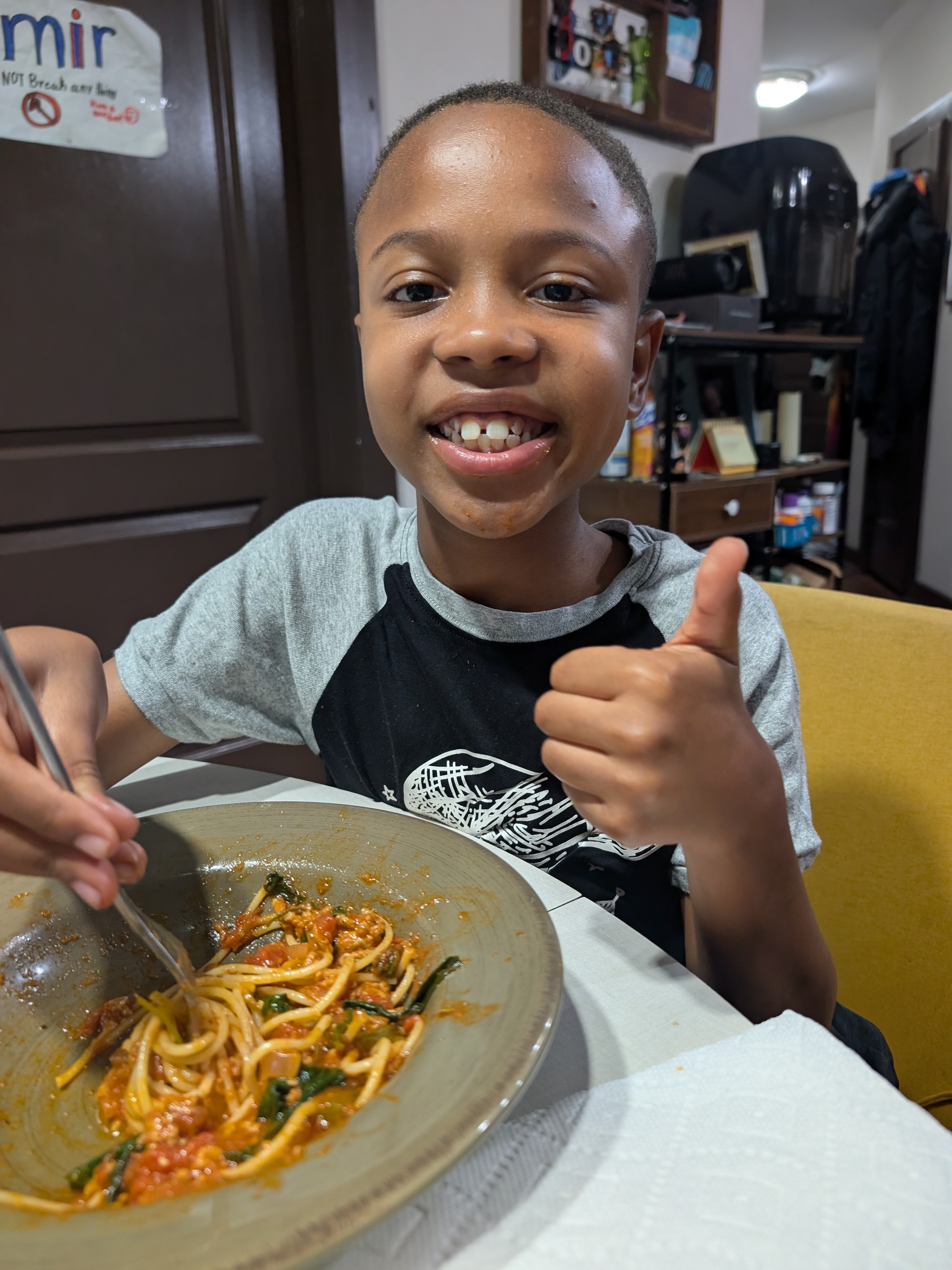 Amir enjoying dinner at home
