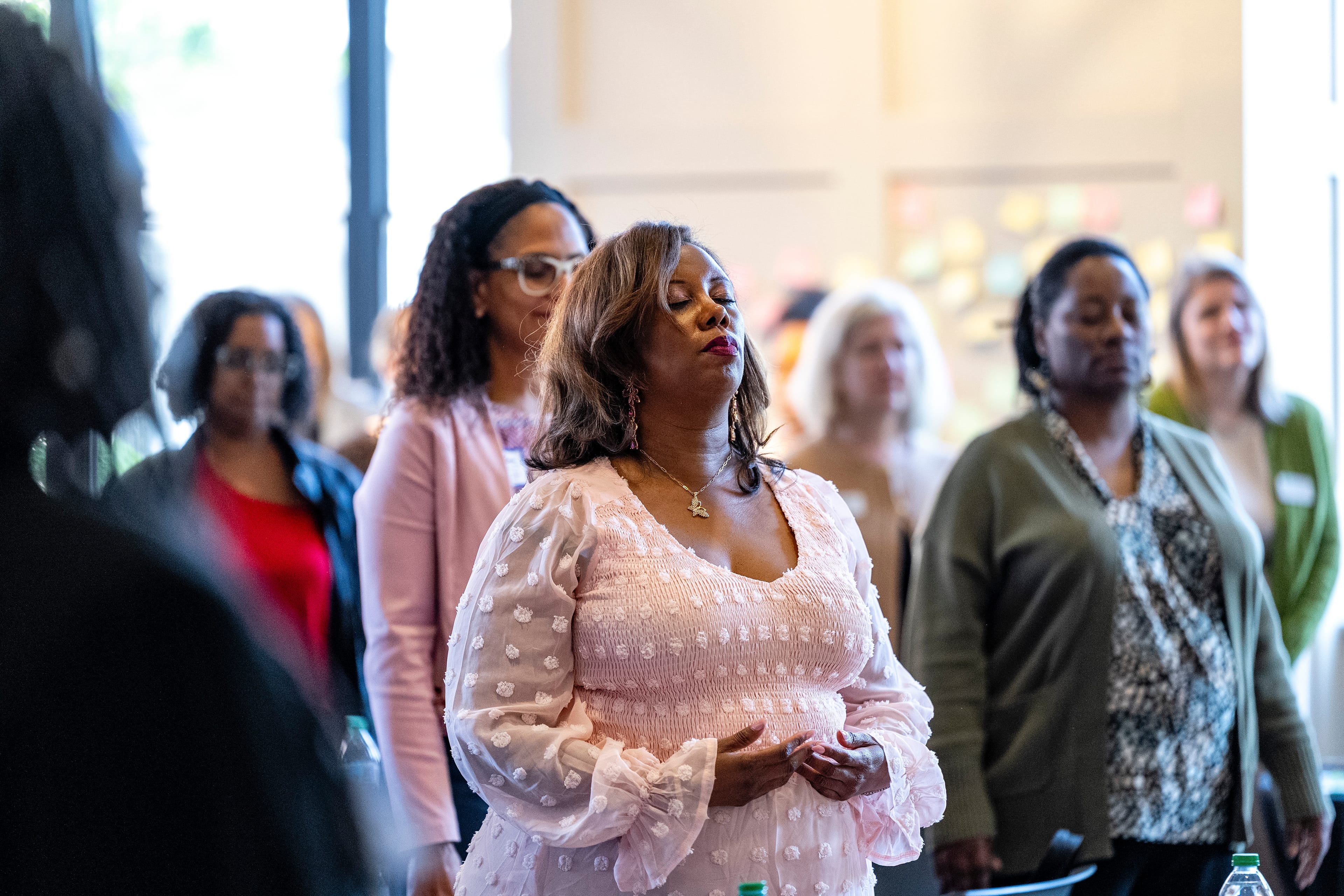 Conference attendees during a guided mindfulness session
